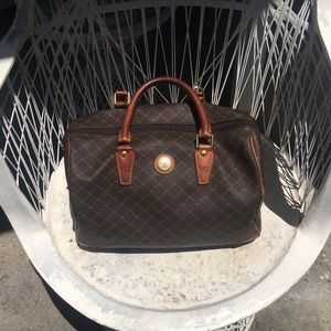 Rioni Designer Bag.  Genuine leather.  Very good shape, slight wear.  $75, OBO